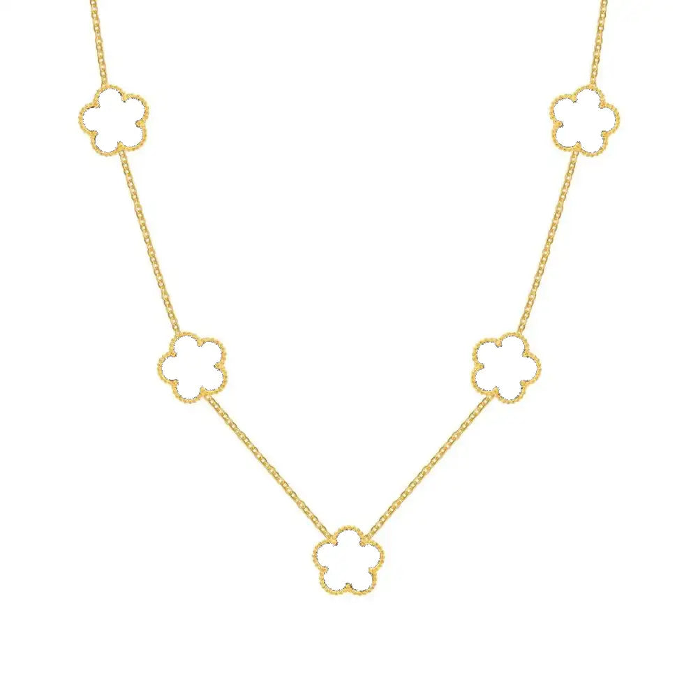 Collier Amaryllis avec pendentifs trèfle blanc, en acier inoxydable plaqué or 14K, disponible chez Rue des Bijoux, alliant élégance et modernité.